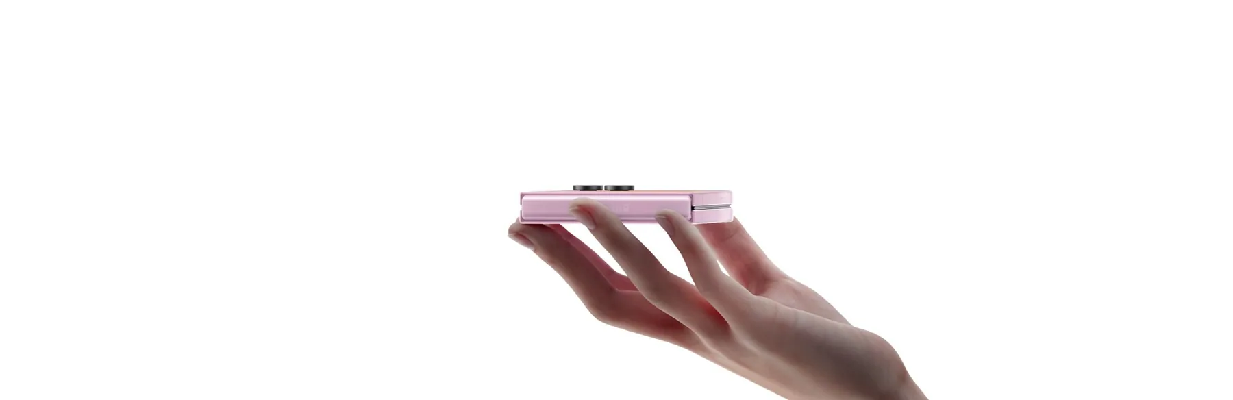 Folded Galaxy Z Flip8 balanced on fingertips to highlight its slim profile