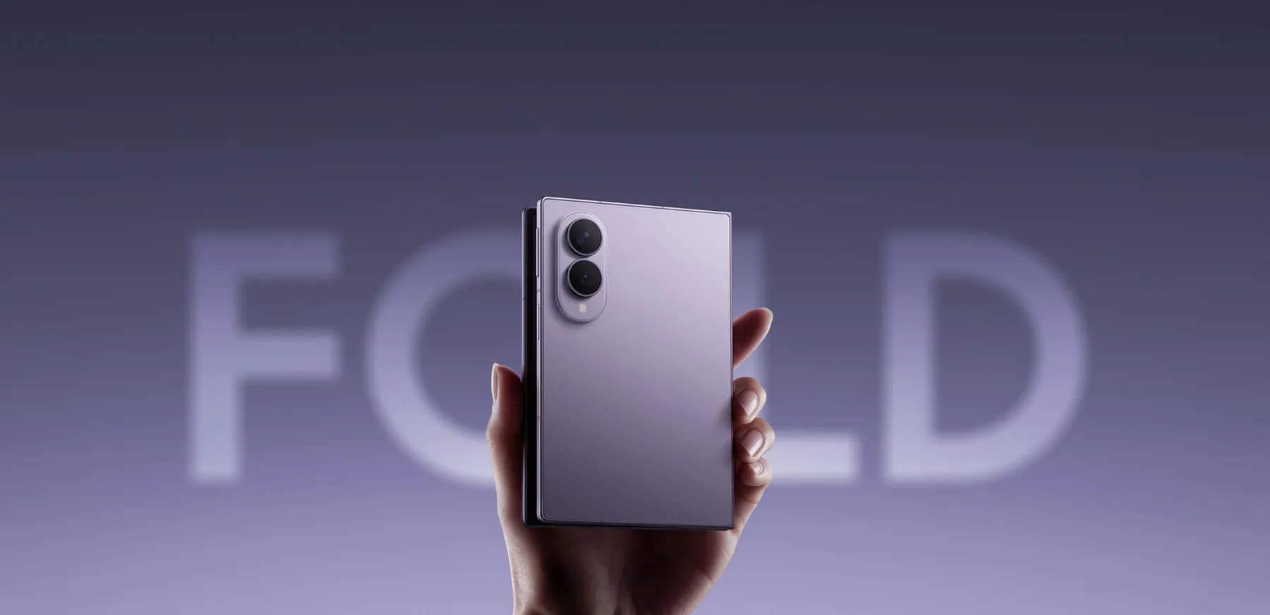Galaxy Z Fold8 key visual: folded phone held in hand in front of large FOLD lettering