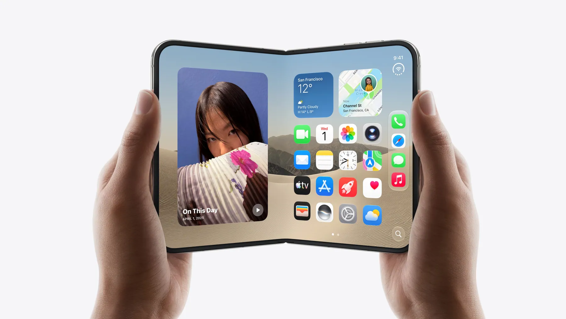 iPhone Duo in Star White held open in landscape, inner display showing the Home Screen